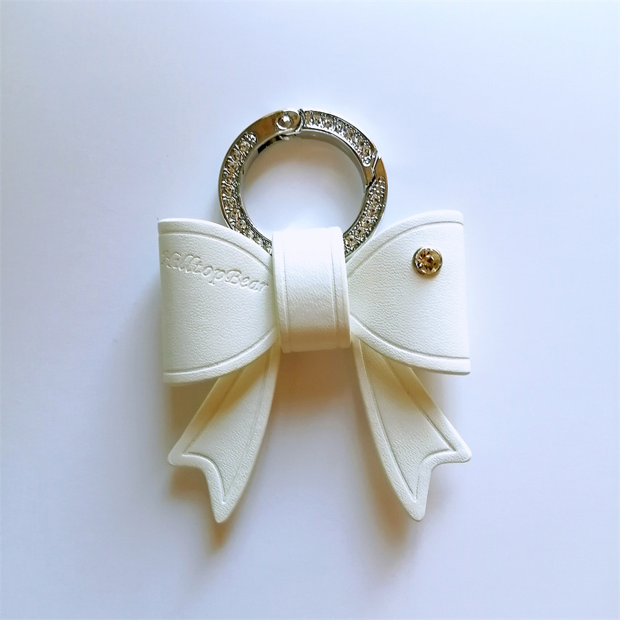 Nuevo arco diamante coche llavero moda exquisito anillo de cuero atmosférica accesorios clave pequeño regalo para las mujeres