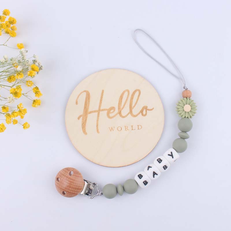Suministros para bebés Tarjeta de hito de madera bebé creativo de dibujos animados Margarita silicona mordedor pezón cadena anti-caída