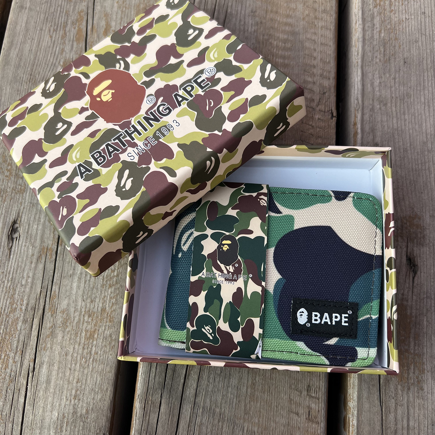 Short human head, camouflage box