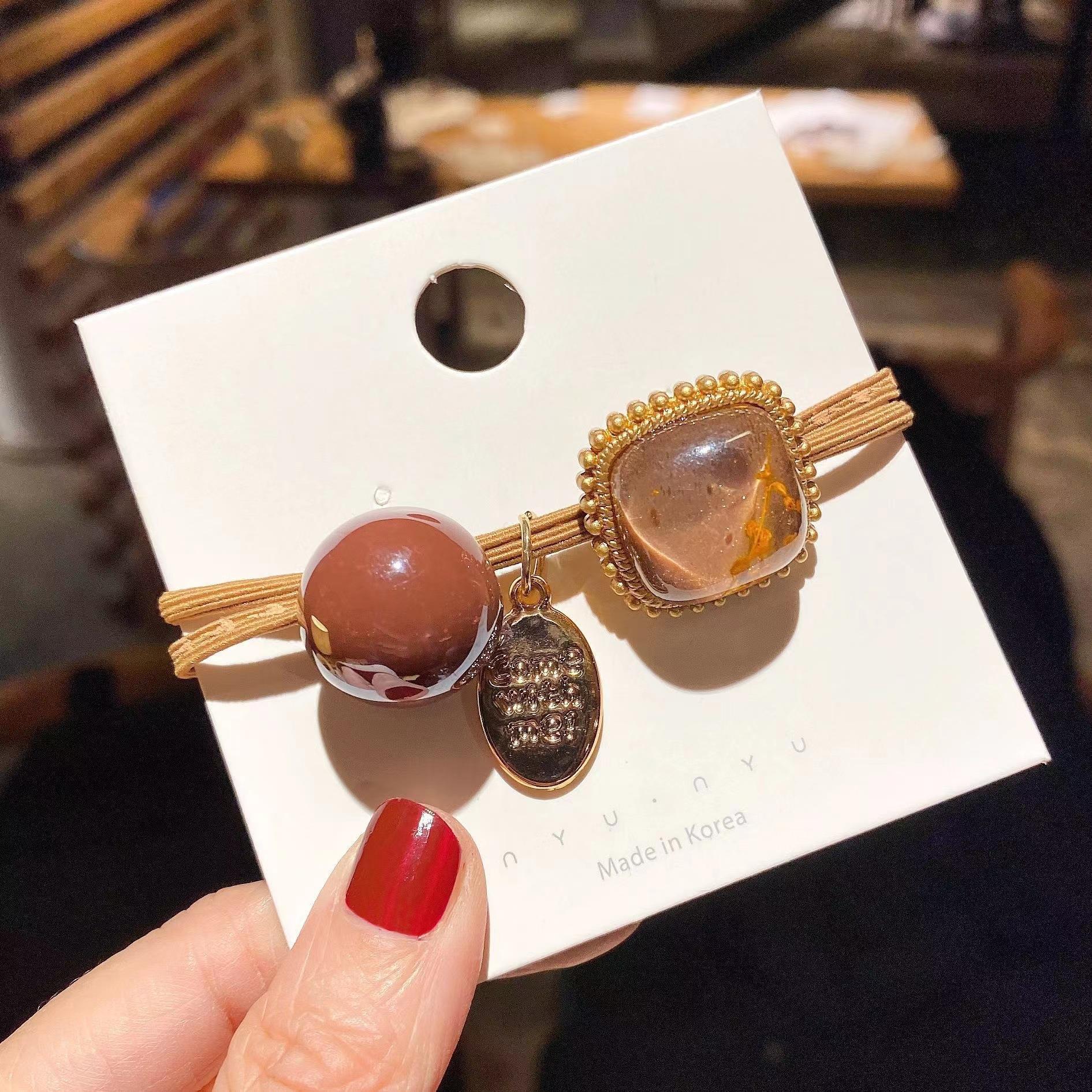 Elástico joyas de cabello de moda con frijoles frescos M anillo de cereza cuerda de cabello al por mayor de la banda de goma cabeza de 100 bolas de cabello rojo una variedad de alta elástica