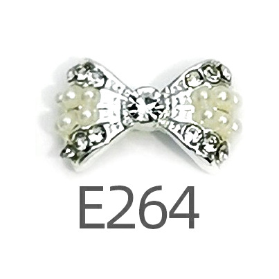 Transfronterizo Japonés arco de uñas accesorios de pajarita caliente simple todo fósforo tridimensional hueco joyería de uñas de diamantes al por mayor