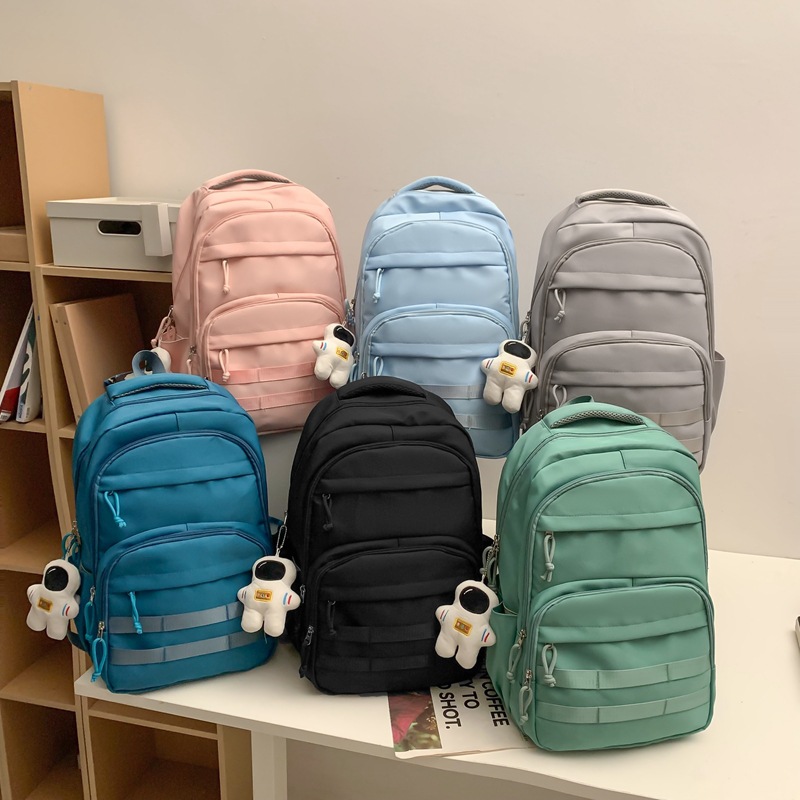 Nueva mochila estilo Coreano simple hombre y mujer estudiante mochila de gran capacidad mochila de la computadora de viaje de ocio