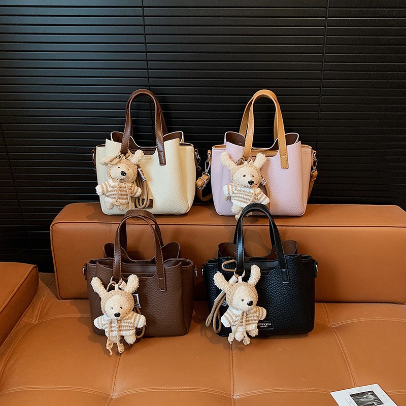 Coreano simple bolso de mano de contraste de color mujer 2026 nueva tendencia de moda de gran capacidad bolso de hombro bolso versátil