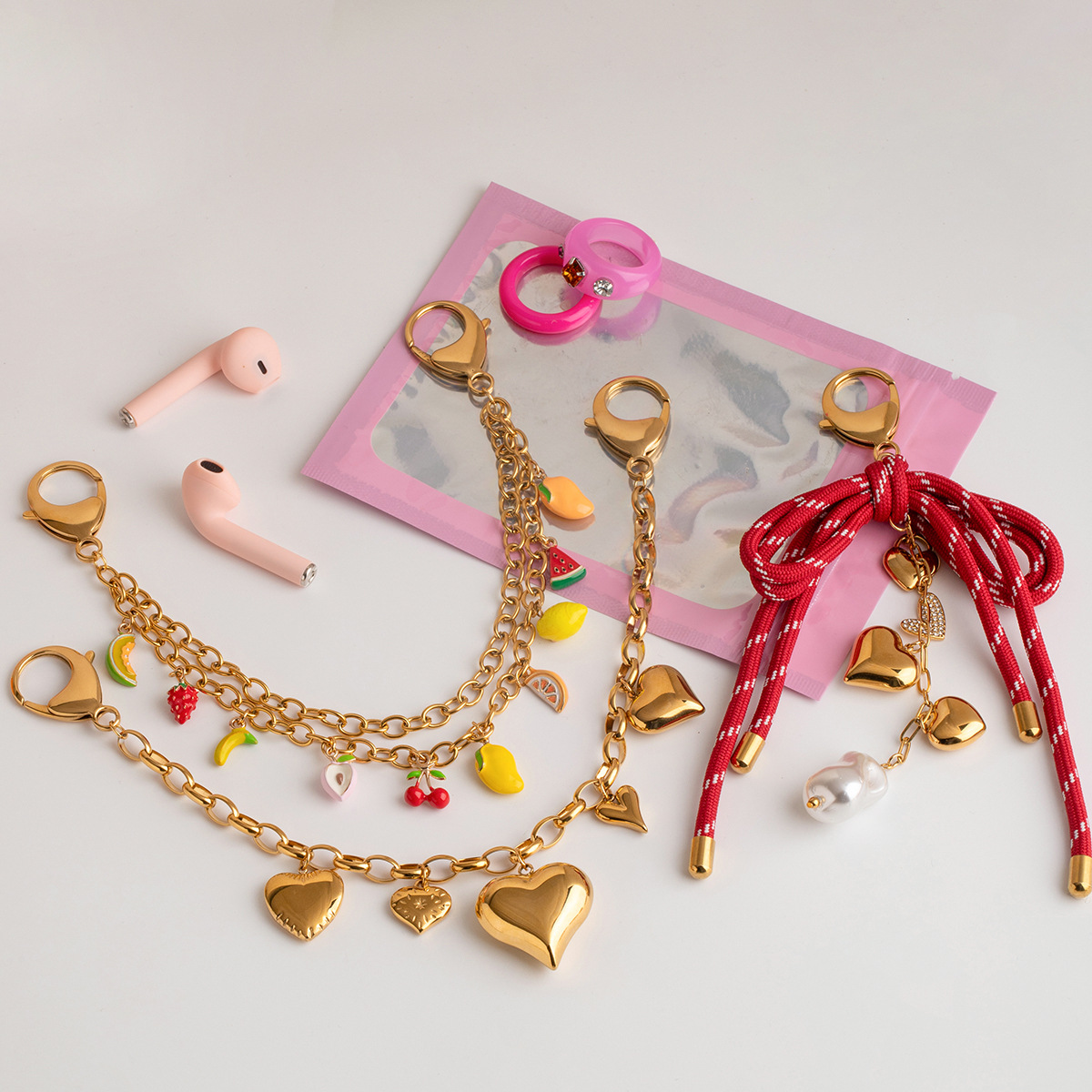 Wanxing Europa y América de alta gama bolso colgante diseño de nicho sentido titanio acero 18 quilates amor dorado fruta cadena colgante joyería de perlas