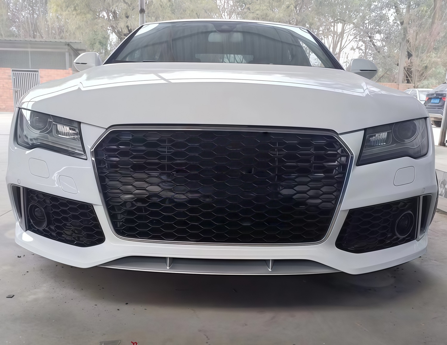 Suitable for Audi 09-15 A7/S7 models, for RS7-style body kit upgrades, specifically designed for the front bumper and front fascia of the S7/RS7