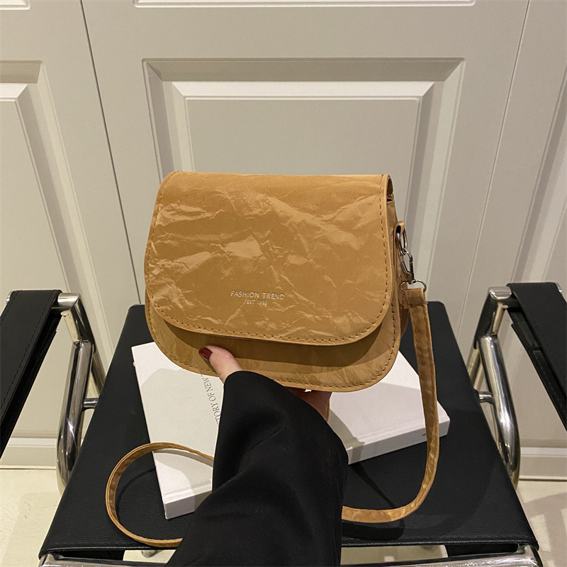 Bolso de silla de montar, bolso de mochila de mujer 2025, nueva moda de verano, moda simple, estilo extranjero, bolso de hombro para mujeres