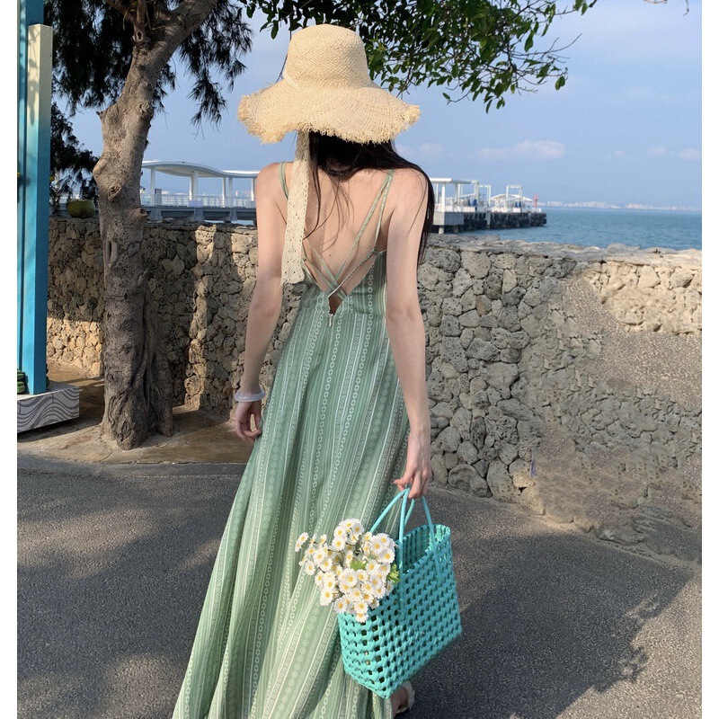 Real shot new light green printed sling dress Yunnan seaside holiday Dew super slim back dress summer