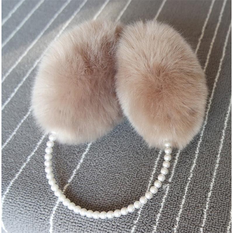 Nueva caliente lindo orejeras de felpa de invierno caliente a prueba de frío fábrica al por mayor de piel de conejo orejeras piel