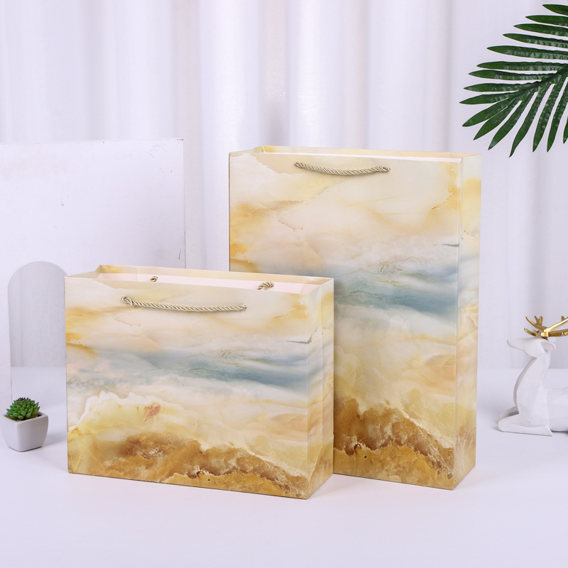 手提袋定 制纸袋订 做批发印制logo图案广告礼品袋印刷服装纸袋子