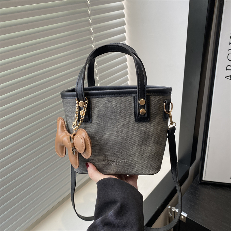 大衆の高級バッグの女性の小包の新型のファッションは肩のファッションの超火の洋風の斜めのショルダーバッグの手提げバケツのカバンを合わせます。|undefined