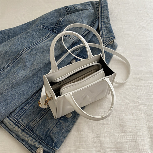 A 2025 trendy and fresh pure-colored textured floral print shoulder crossbody and hand-held small square bag