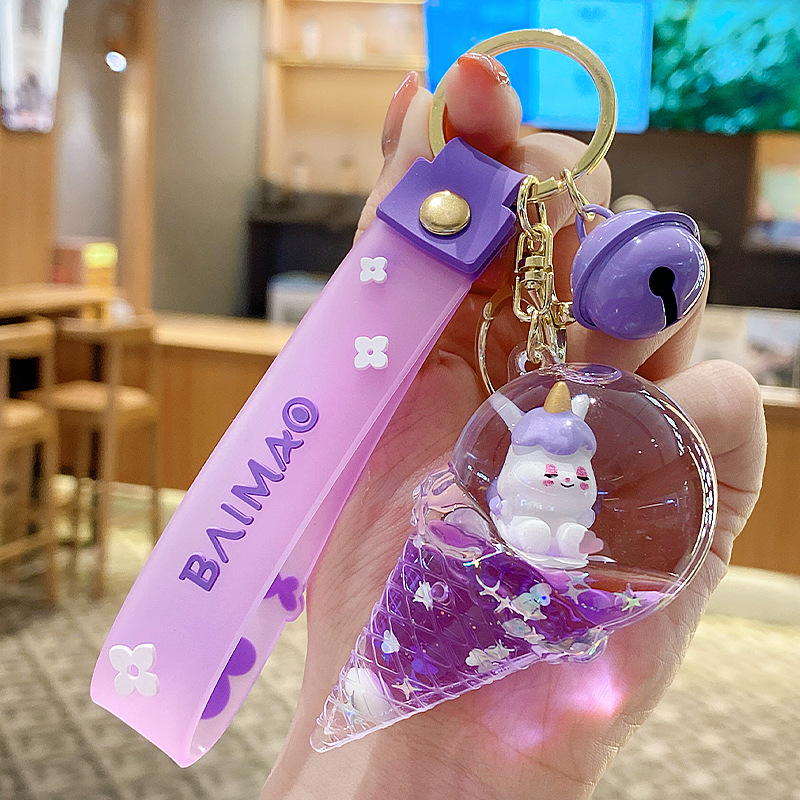 Llavero de unicornio transfronterizo para mujer, exquisito y lindo colgante de botella de arena líquida de cristal con forma de helado, accesorio para mochila, pequeño adorno.