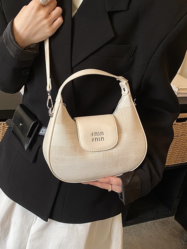 2026 nuevo nicho de diseño bolso de media luna retro bolso de moda universal bolso de mano de mujer casual bajo bolso de hombro