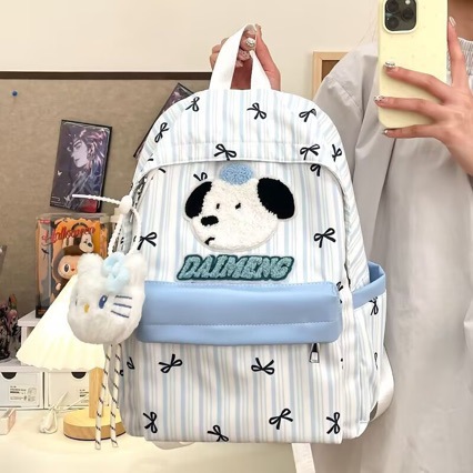 Limpieza banda de dibujos animados mochila de perros pequeños estudiantes frescos versátiles mochila de gran capacidad arco mochila de chicas