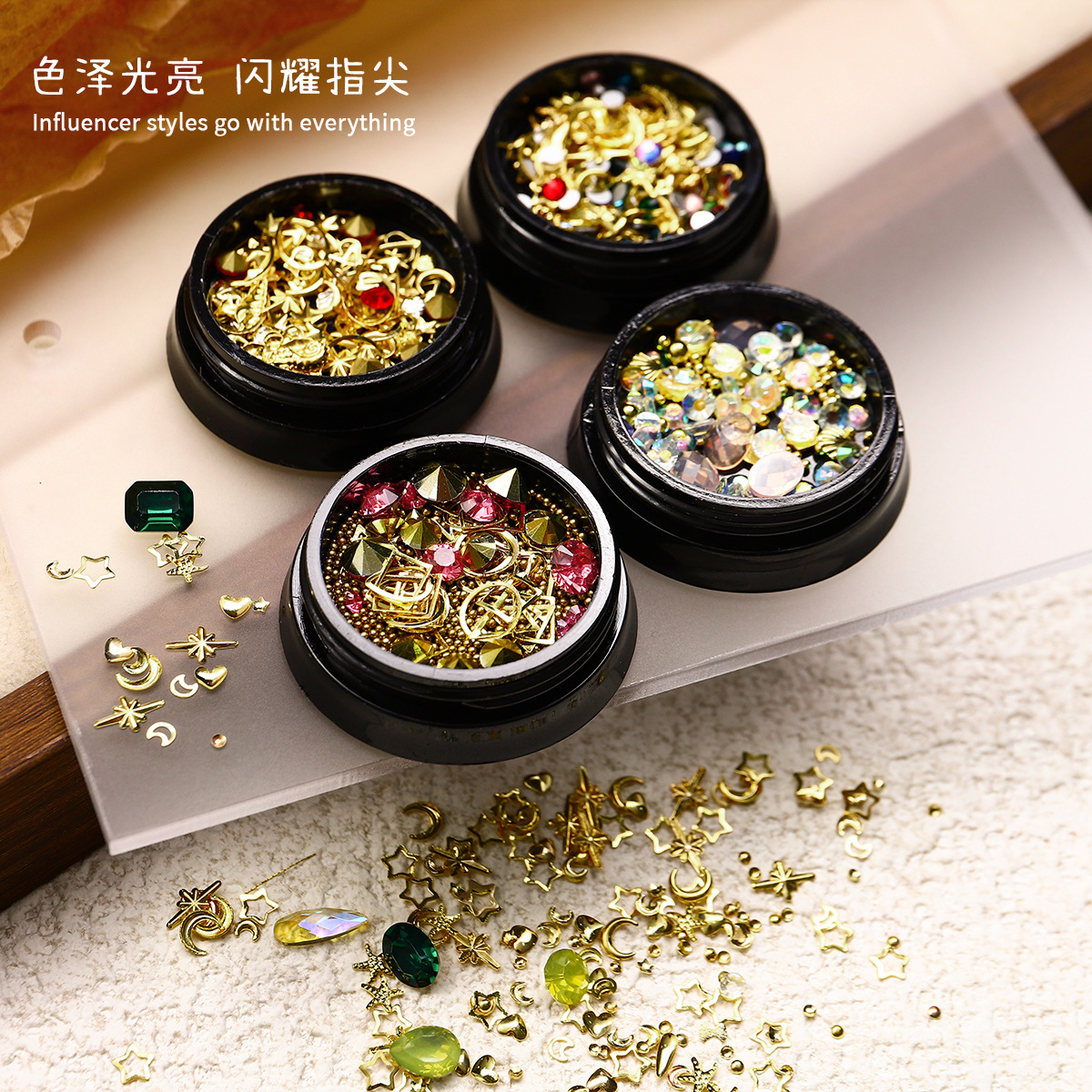 Nuevas joyas de manicura transfronterizas joyas de la luna de estrellas mezcladas caja de metal conjunto de cobre popular remaches accesorios de manicura