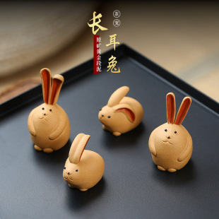 Wholesale Yixing purple sand rabbit ornaments twelve zodiac Rabbit Tea pet creative can raise tea tray tea table manufacturers