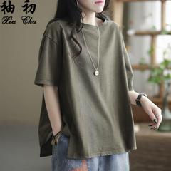Tシャツの女性の夏服の新型半袖のゆったりとしたレトロな純色の百合はやせている服のtシャツの上着を見せます。