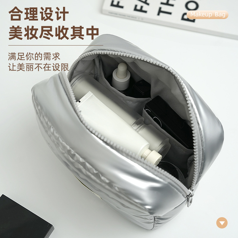 Nueva bolsa de almacenamiento portátil Xinghui, bolsa de cosméticos de mano, bolsa de almacenamiento de plumón de viaje, bolsa de cosméticos de gran capacidad y alto valor