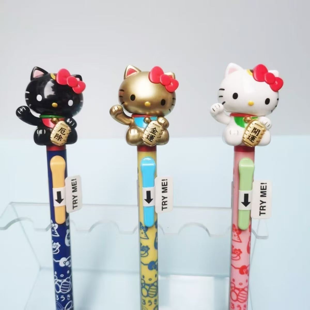 Edición japonesa de Sanrio hellikitty para atraer la fortuna Gato agitar bolígrafo pulsar el movimiento kt para atraer la fortuna Exorcise Kitty Gato