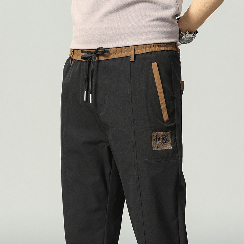 Pantalones casuales de los hombres primavera y otoño nuevo slim fit flaco chino bordado elástico cintura encaje casual jeans ropa