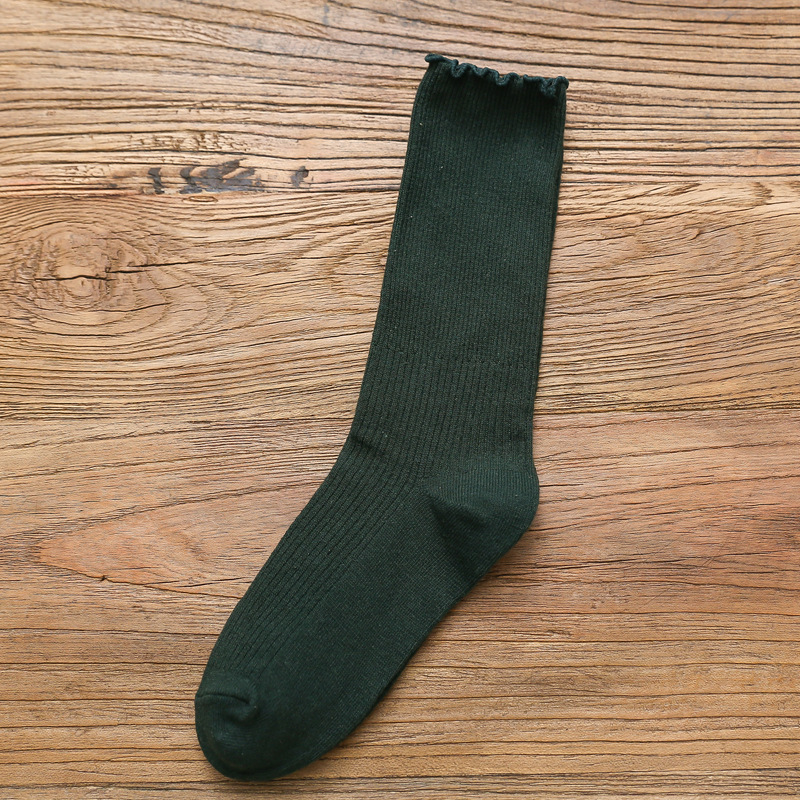 Primavera y otoño de las mujeres delgadas de algodón oreja de madera doble aguja pila calcetines japoneses retro color sólido ins largos calcetines casuales al por mayor