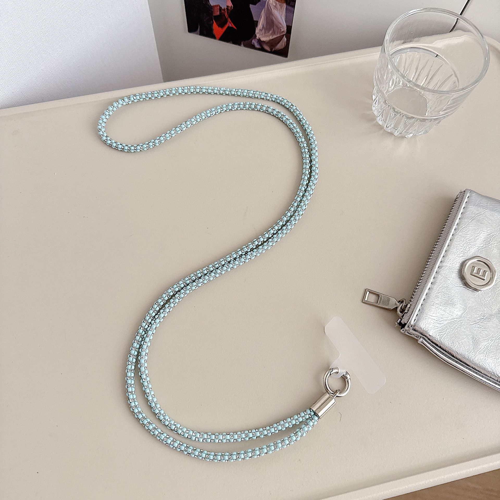 Cadena colgante de teléfono móvil de alta gama hecha a mano de boutique, sensación femenina de alta gama, lujo ligero, cadena colgante de diamante completo, cadena colgante de teléfono móvil de moda, sección larga y corta