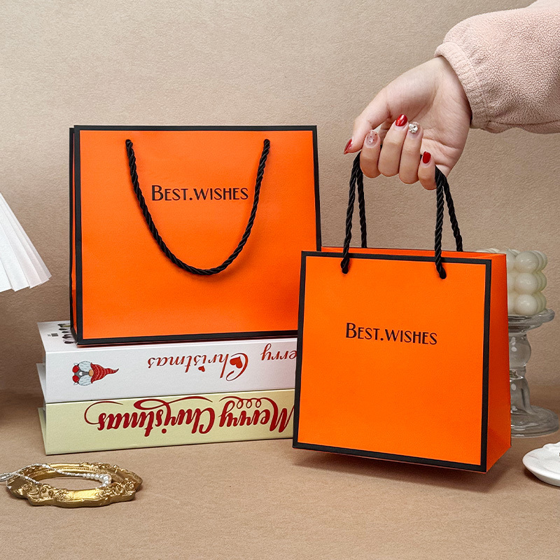 En stock naranja gran bolsa de regalo bolsa de embalaje cosmético ropa engrosada cartón blanco bolso de fábrica al por mayor