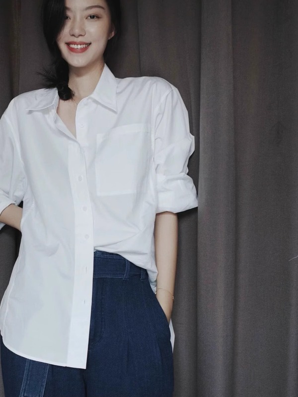 春の新作の白いシャツの女性の中には冷たい系の高級感があります。|undefined