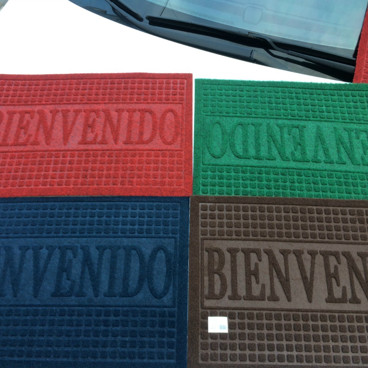 Fábrica directa de exportación barata de comercio exterior español estirado esteras en relieve ventas calientes alfombras de piso de entrada