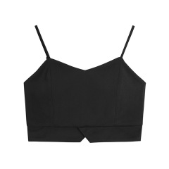 Women's black spaghetti strap backless camisole short sleeve top, with removable cups, versatile for wearing over or under a blazer, highlighting the collarbone and back.