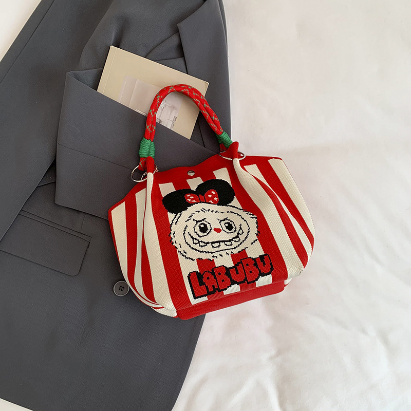 Bolsa de impresión coreana de niña nicho bolso de cubo de diseño diario versátil bolso de mano para estudiantes de viaje diario