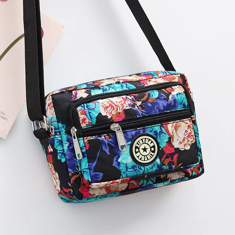 Bolsa de tela de flores bolsa de mensajero de las mujeres nueva bolsa de Madre de gran capacidad bolsa de hombro individual de mediana edad y ancianos bolsa de tela Oxford bolsa