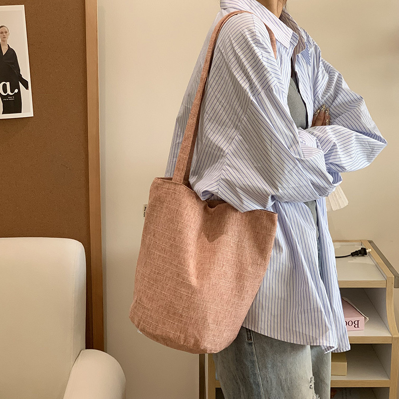 Bolso de mujer nuevo cubo de hombro material de lana versátil textura de ocio bolso de mano de viaje bolsa de tela de gran capacidad mochila