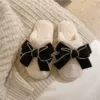 With bow, black