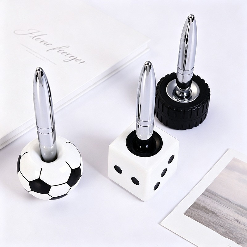 Creative football tire-shaped dice desk pen, plastic magnetic levitation pen, suitable for banks and hotels, customizable with a logo