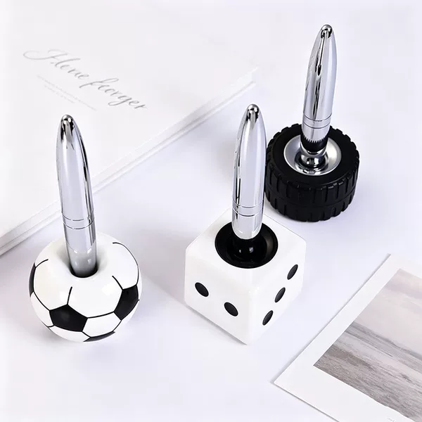 Creative football tire-shaped dice desk pen, plastic magnetic levitation pen, suitable for banks and hotels, customizable with a logo