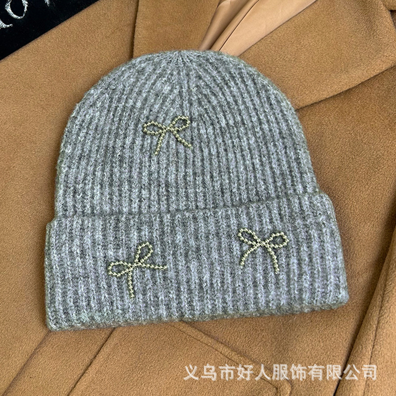 韓国版のファッションの新型の小さい香風の真珠の蝶結びの毛糸の帽子の大きい頭の周りの耳のメリヤスの冷たい帽子の頭の帽子の潮|undefined