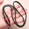 Carnelian: black rope