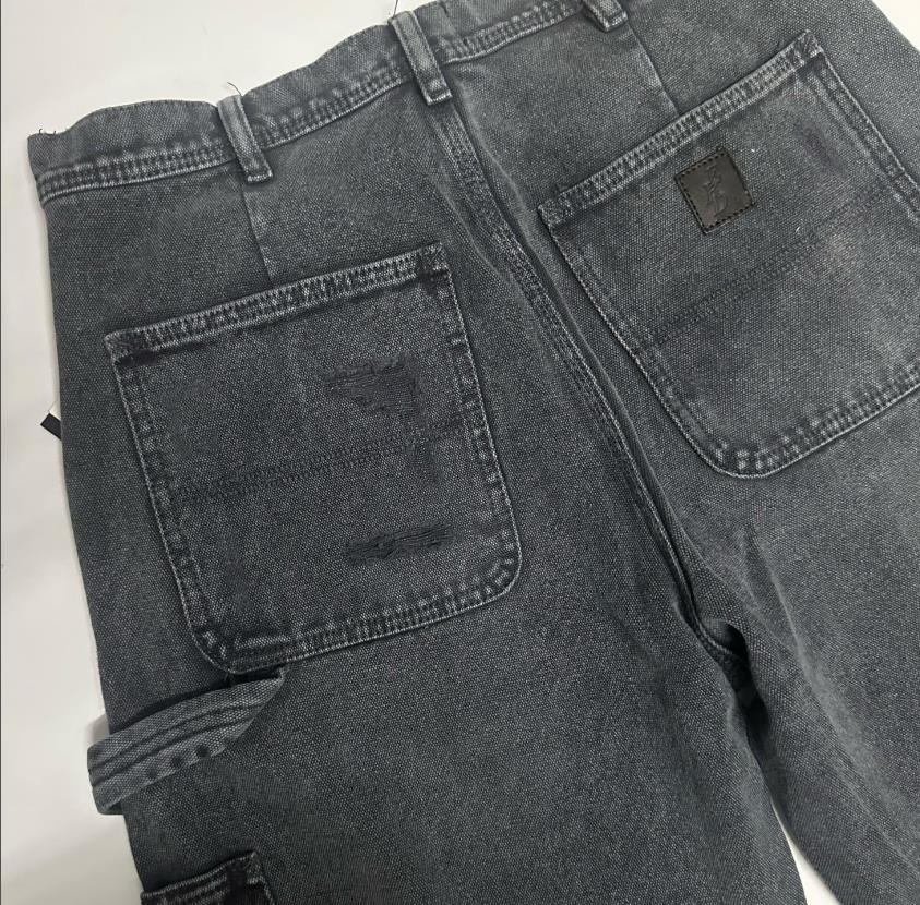 Jeans uomo loose gamba dritta lavaggio denim con strappi_voghion.com