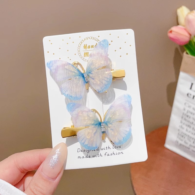 Clip de cabello de mariposa móvil ultra inmortal electrónica azul tulle perla clip de boca de pato decoración accesorios de playa clip tocado