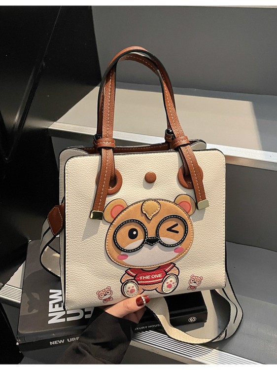 Bolso Tote transfronterizo para mujer de gran capacidad 2025 nuevo bolso bandolera de banda ancha salvaje de verano bolso de clase portátil de ocio