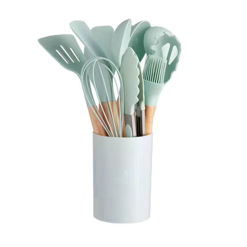 Comercio exterior venta caliente set de cocina de silicona 12 piezas set de silicona antiadherente set de barril de almacenamiento giratorio