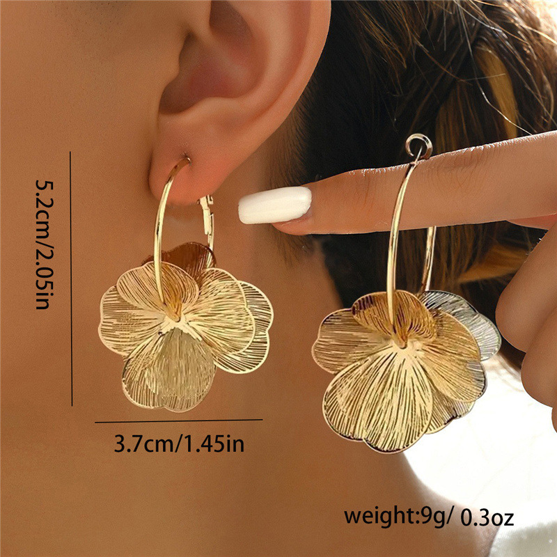 Orecchini a clip fiore oro eleganti cerchi nicchia alla moda_voghion.com