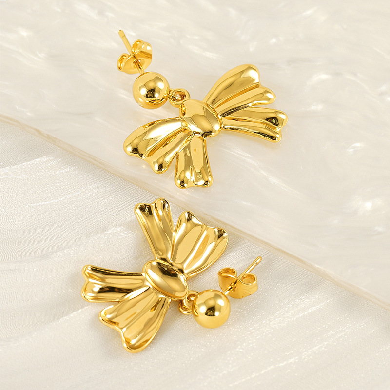 2024 nuevos pendientes de lazo para mujer, lujo ligero, nicho, pendientes de temperamento simple de alto nivel, personalidad de moda, pendientes de todo fósforo