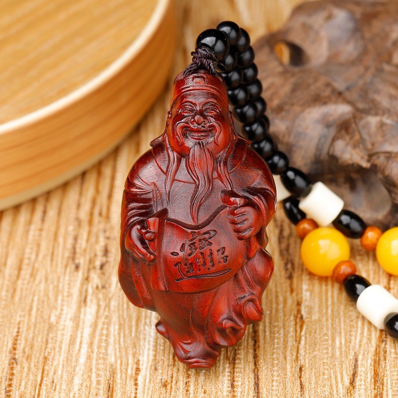 紫檀木の彫刻は壺の福袋を手にして、手にします。|undefined