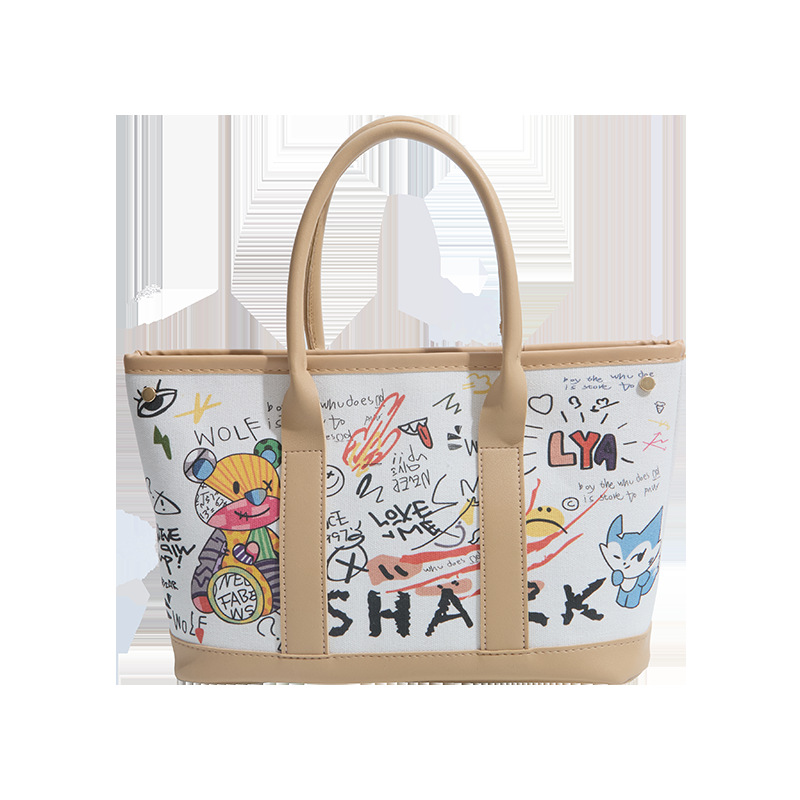 Invierno nuevo bolso de mujer personalidad graffiti portátil 2026 letras casuales Bear Tot bolso de cubo de hombro mochila