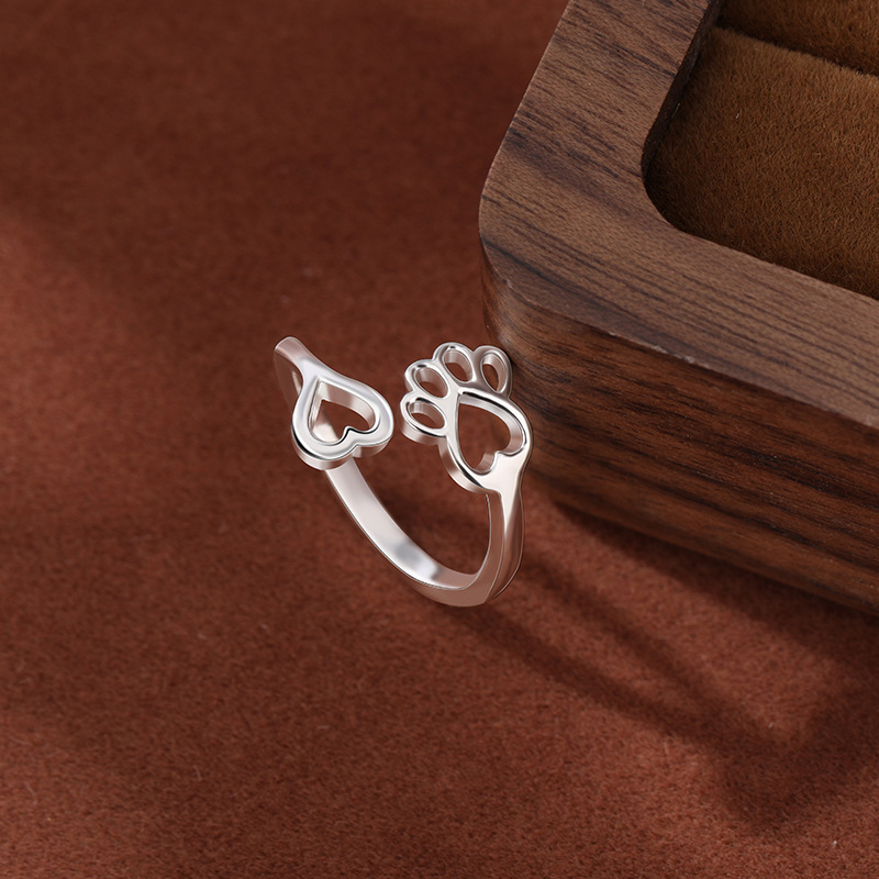 TEMU transfronterizo Amazon 925 plata esterlina hueco garra de gato impresa huella de perro anillo de dedos de cola abierto anillo de articulación femenina