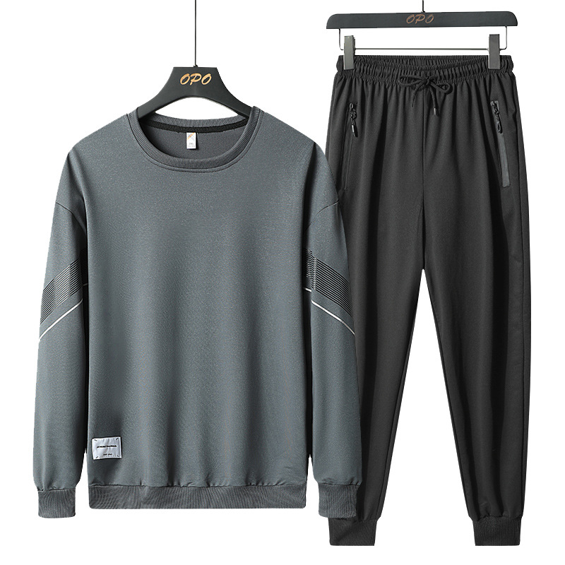 Primavera y otoño juego deportivo de cuello redondo hombre juego casual de dos piezas para hombres delgado simple camiseta jeans para hombres