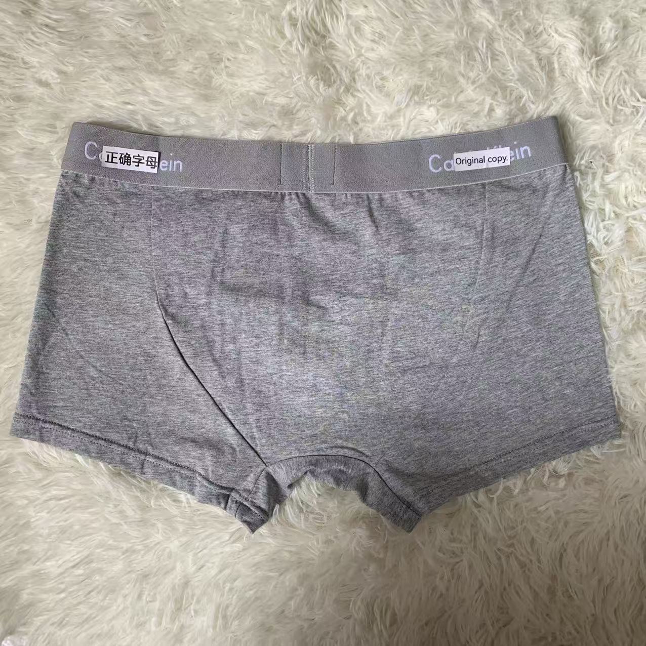 Pantalones íntimas de algodón para hombres, pantalones de corte de moda de comercio exterior de Amazon, pantalones cortos de borde blanco al por mayor.