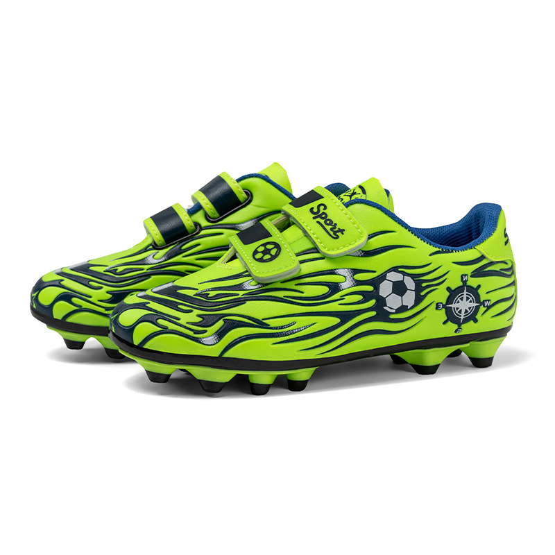 Niños y niñas transfronterizos competición de césped niños transpirables cómodos deportes ocio clavos fabricantes de zapatos de fútbol